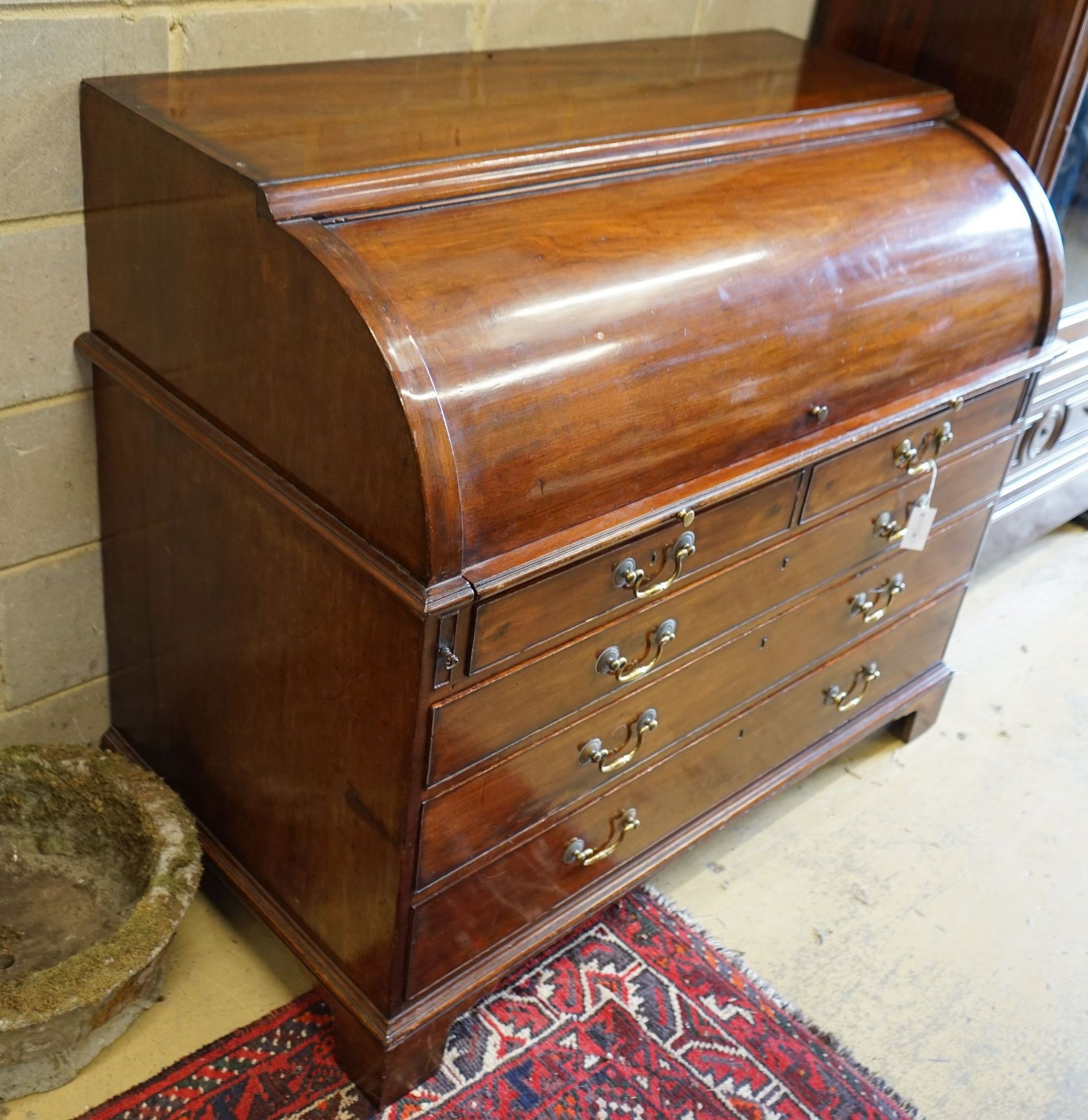 A George III mahogany cylinder bureau, width 127cm, depth 67cm, height 107cm